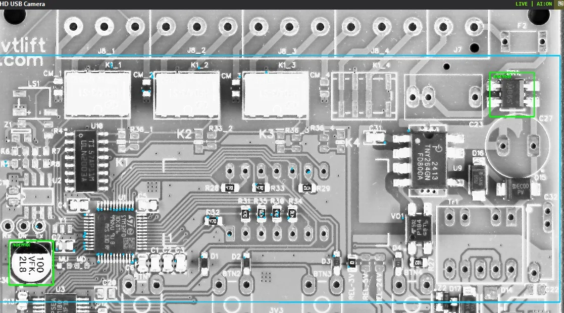Live frame from the example: two zones – the BR1 bridge on the top right and the C30 capacitor on the bottom left, both green with the label "normal". The blue lines are the alignment region boundaries, and the blue dots are the reference points used to locate the board in the frame.